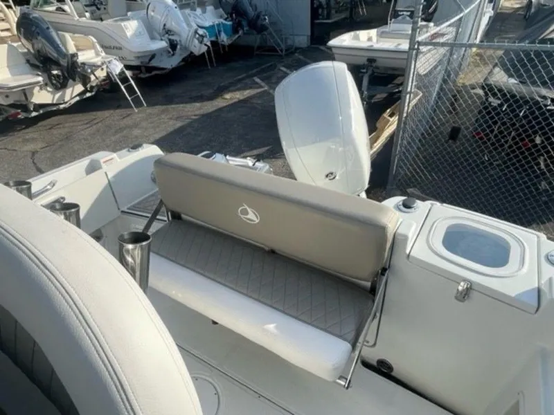 Slide: The Image of 2024 Finseeker 210 FS boat interior with seating and storage compartments. - 8