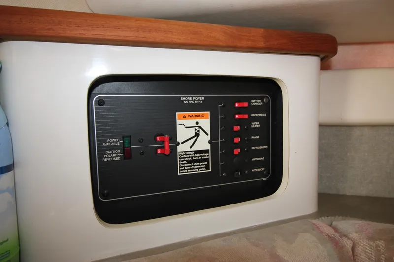Slide: The Image of Electrical control panel on a 1994 Bayliner 3055 Sunbridge boat. - 27