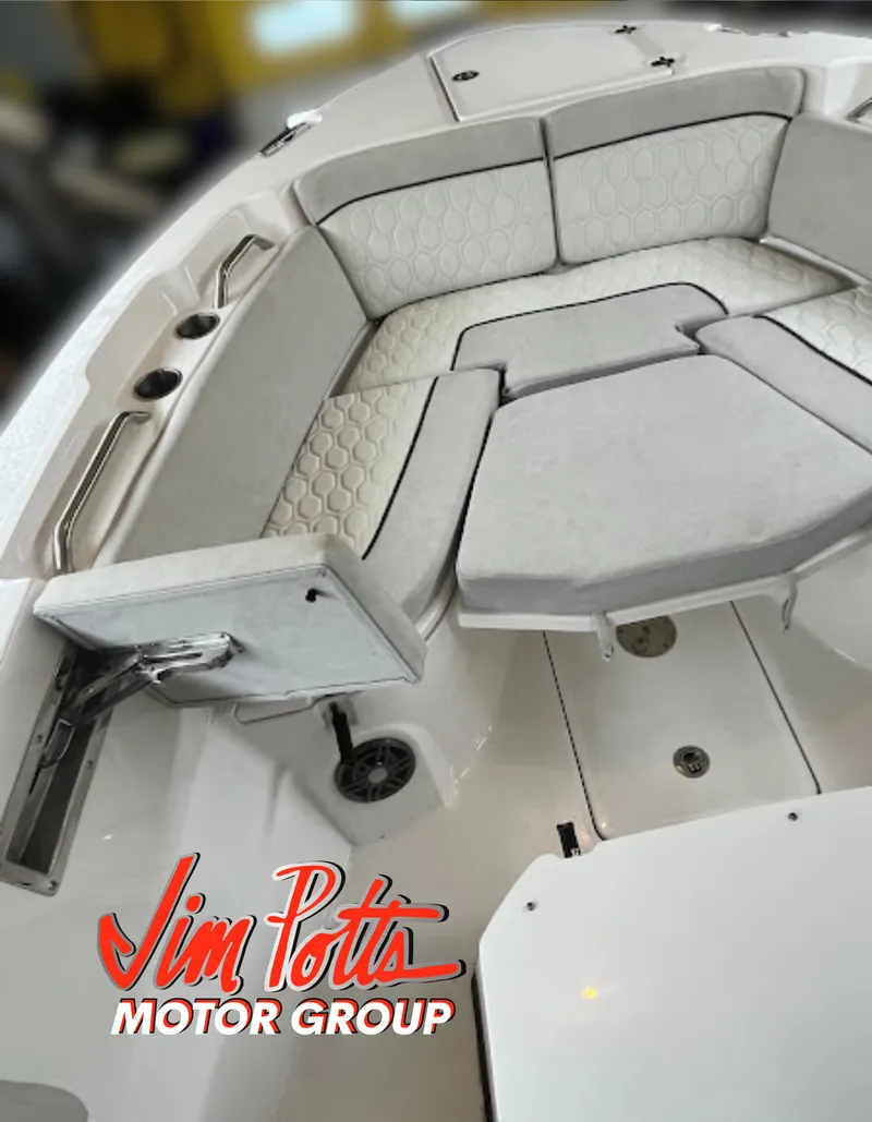 Slide: The Image of 2023 Sea Fox 268 Commander boat interior with cushioned seating, showcased by Jim Potts Motor Group. - 30
