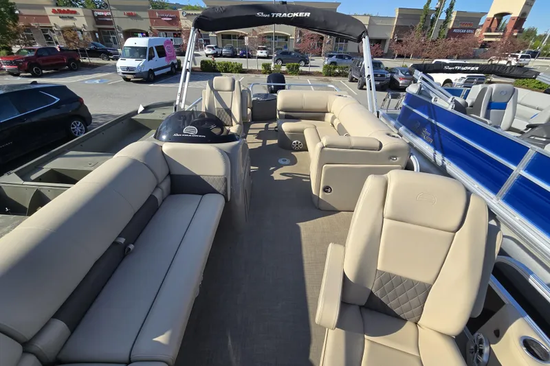 Slide: The Image of 2023 Sun Tracker SportFish 20 DLX pontoon boat with spacious seating and modern design. - 8