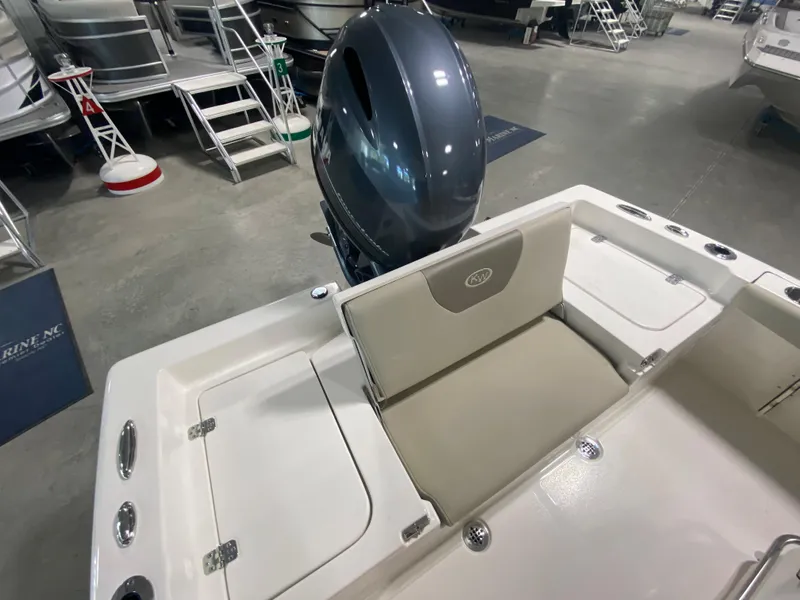 Slide: The Image of 2024 Key West 179 FS boat interior with outboard motor in showroom. - 8