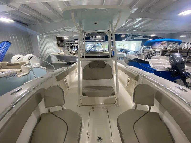 Slide: The Image of 2024 Key West 244 CC center console boat interior in showroom. - 18