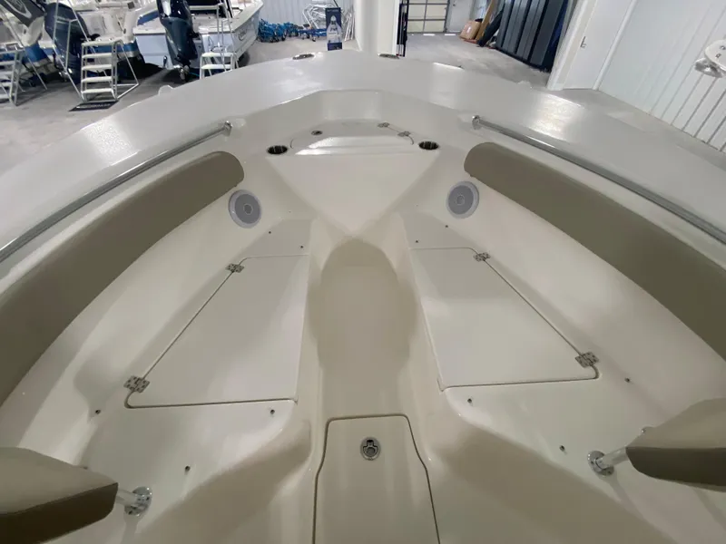 Slide: The Image of 2024 Key West 244 CC boat interior with seating and storage compartments. - 20