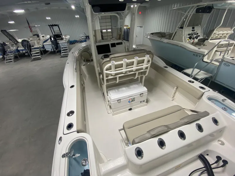 Slide: The Image of 2024 Key West 244 CC center console boat interior in showroom. - 5