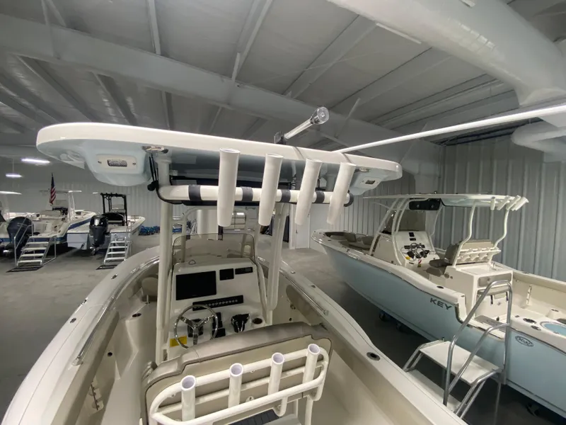 Slide: The Image of 2024 Key West 244 CC center console boat in showroom. - 6