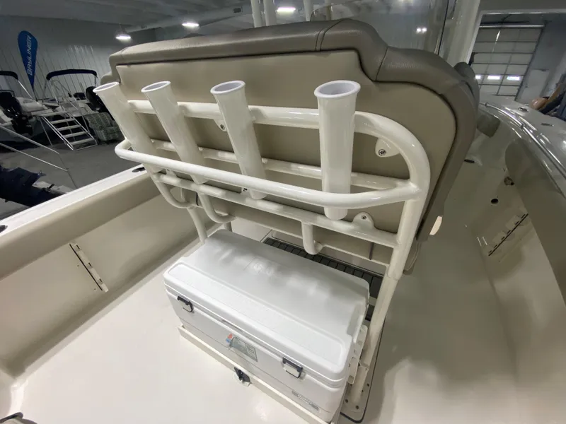 Slide: The Image of 2024 Key West 244 CC boat with rod holders and cooler. - 9