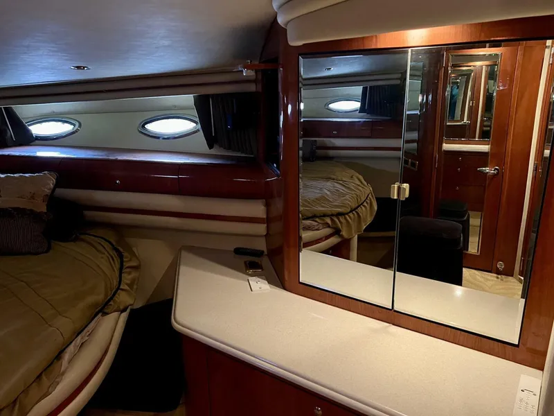 Slide: The Image of Luxurious cabin interior of a 2001 Sea Ray 56 Sedan Bridge yacht. - 10