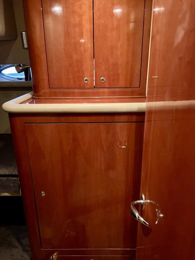 Slide: The Image of Interior cabinetry of 2001 Sea Ray 56 Sedan Bridge yacht. - 15