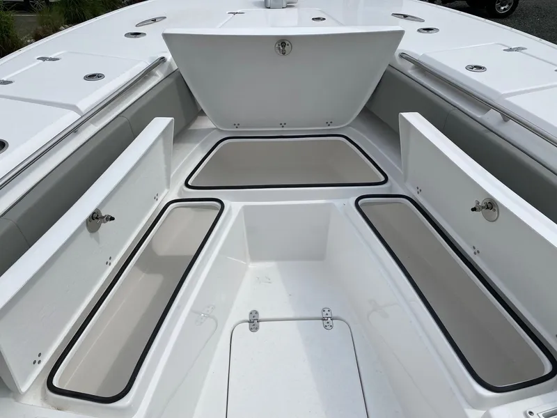Slide: The Image of 2024 Cape Horn 34 XS boat storage compartments open. - 11