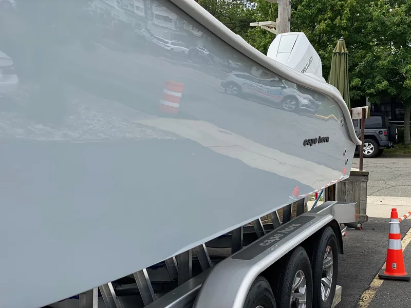 Slide: The Image of 2024 Cape Horn 34 XS boat on trailer, side view. - 18