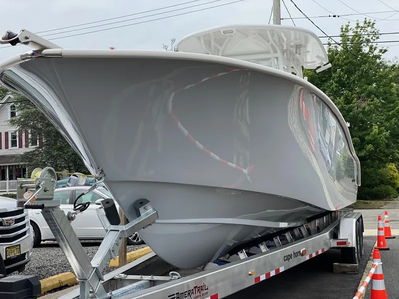 Slide: The Image of 2024 Cape Horn 34 XS boat on trailer, side view. - 20