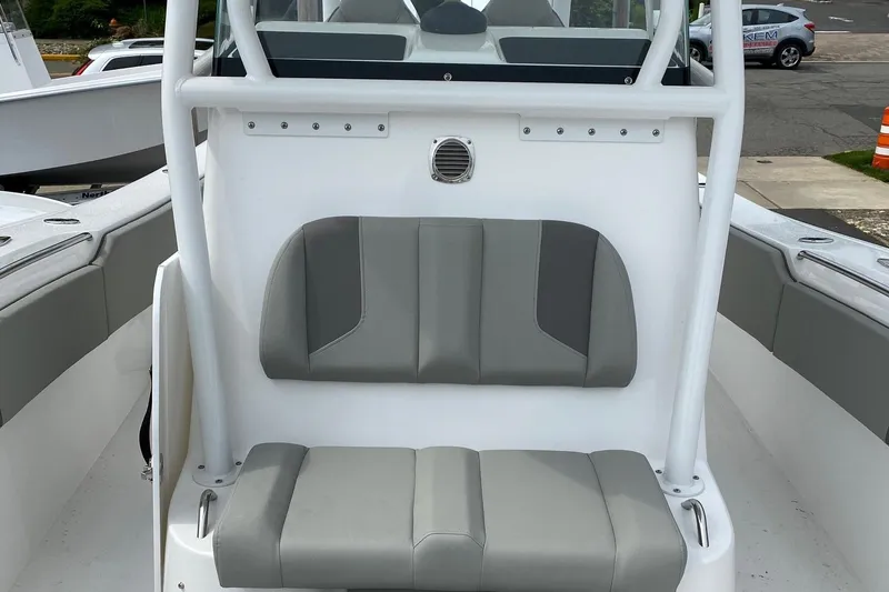 Slide: The Image of 2024 Cape Horn 34 XS boat with gray cushioned seating. - 28