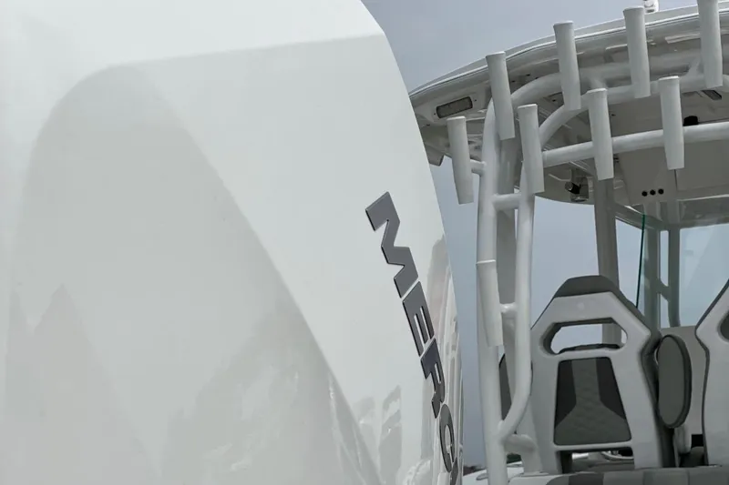 Slide: The Image of 2024 Cape Horn 34 XS boat with Mercury engine and seating. - 32