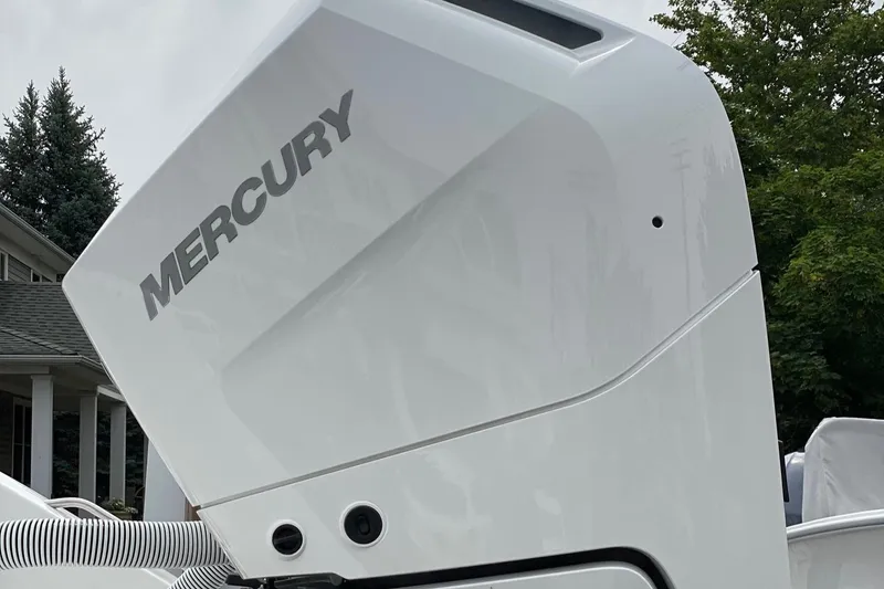 Slide: The Image of 2024 Cape Horn 34 XS with Mercury outboard engine. - 34