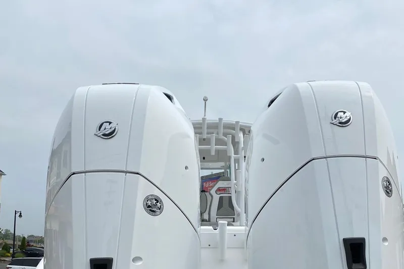 Slide: The Image of 2024 Cape Horn 34 XS boat with twin outboard engines. - 35
