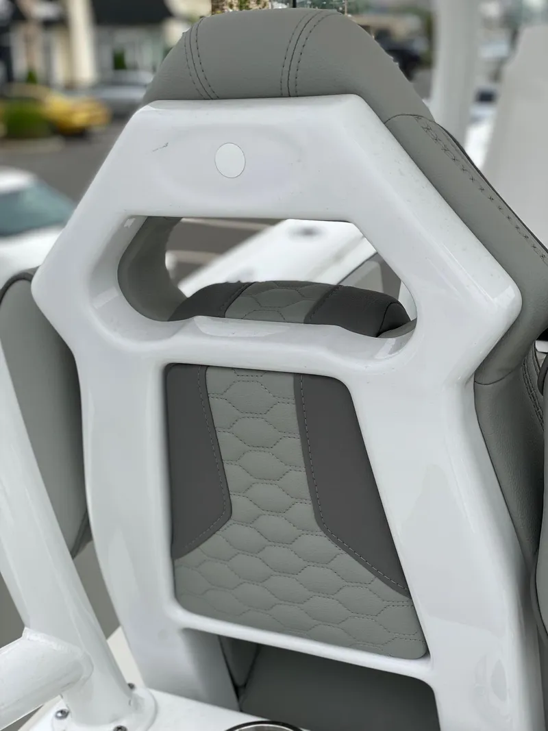 Slide: The Image of 2024 Cape Horn 34 XS boat seat with modern design and gray upholstery. - 4