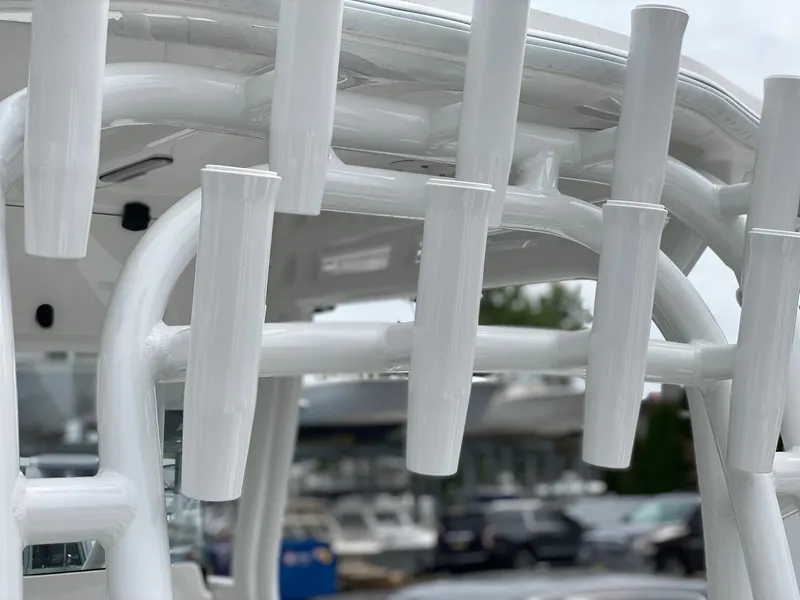 Slide: The Image of Close-up of 2024 Cape Horn 34 XS rod holders on a boat. - 5