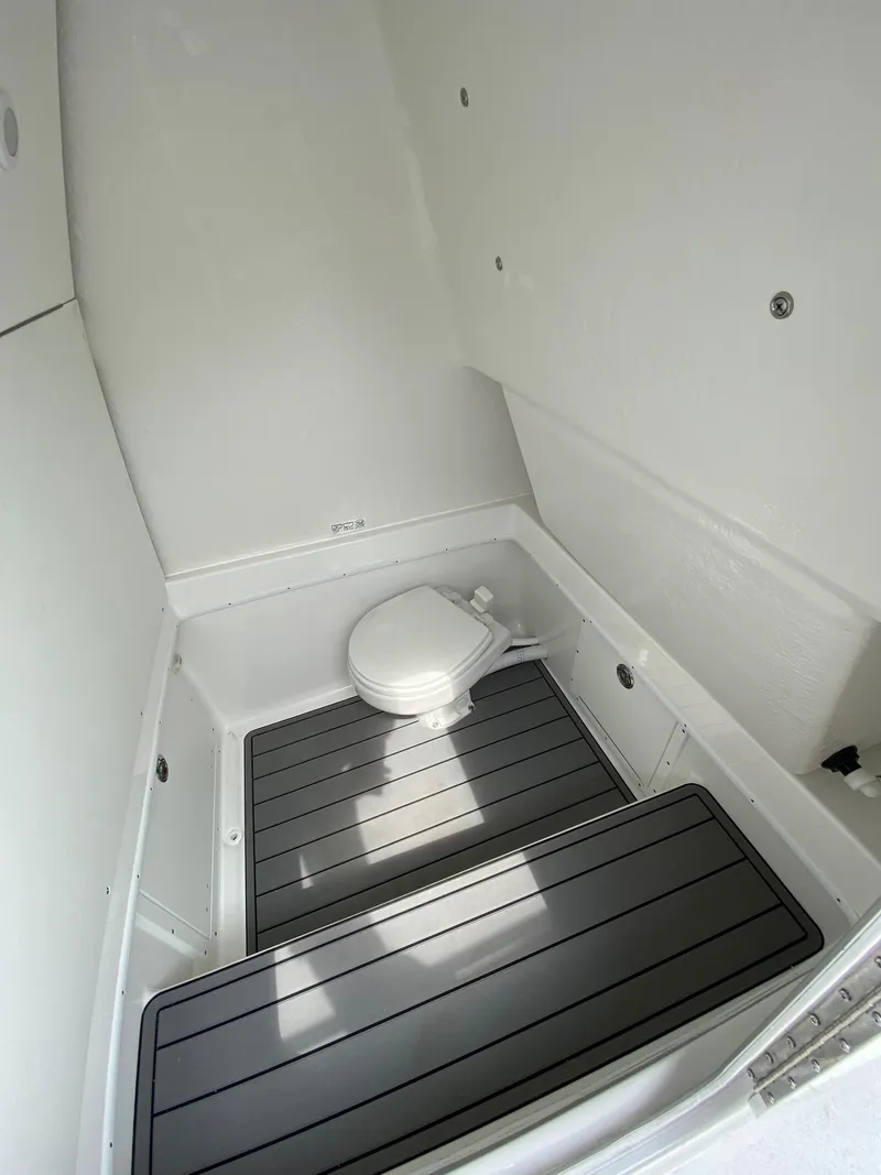 Slide: The Image of 2024 Cape Horn 34 XS boat interior with toilet and non-slip flooring. - 7