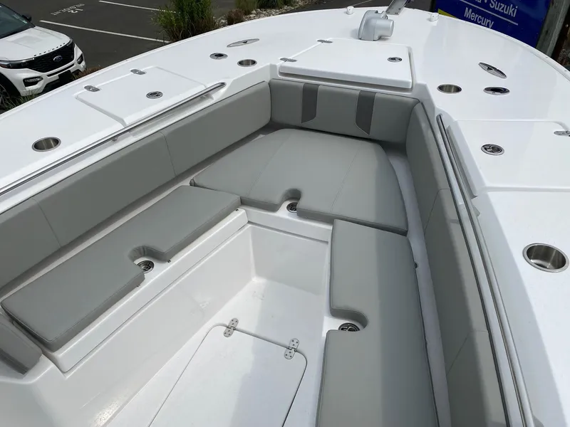 Slide: The Image of 2024 Cape Horn 34 XS boat with spacious seating and storage compartments. - 9