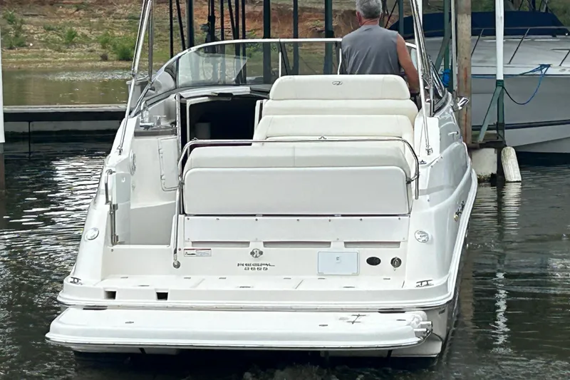 Slide: The Image of Interior of 2008 Regal 2665 Commodore yacht with kitchenette and seating area. - 20