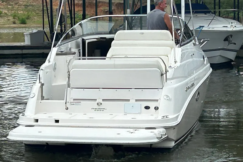 Slide: The Image of Interior of 2008 Regal 2665 Commodore yacht with kitchenette and seating area. - 21