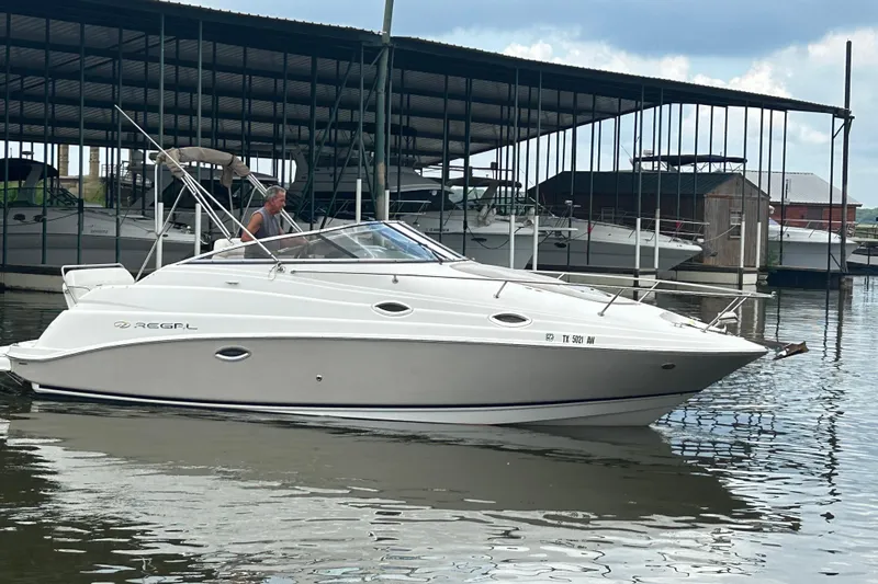 Slide: The Image of 2008 Regal 2665 Commodore boat dashboard with steering wheel and instrument panel. - 25