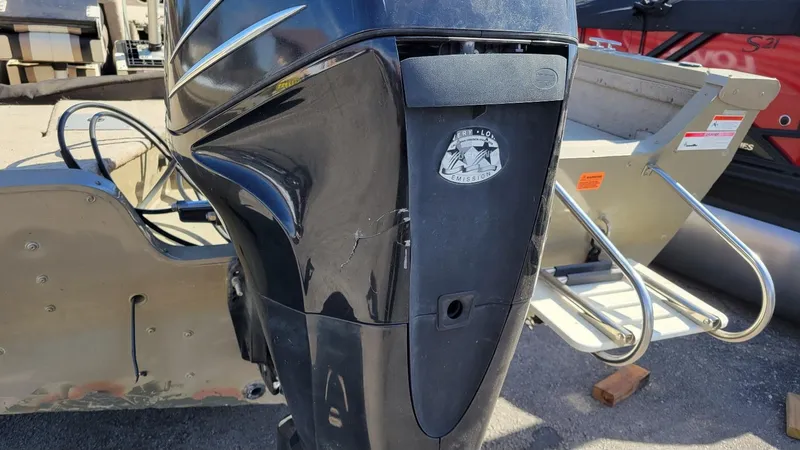 Slide: The Image of 2008 Lowe FS185 boat with Mercury 150 engine, featuring walk-thru windshield. - 11