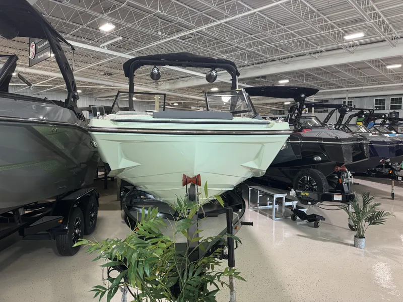 Slide: The Image of 2023 Heyday H22 boat on display in a showroom. - 5