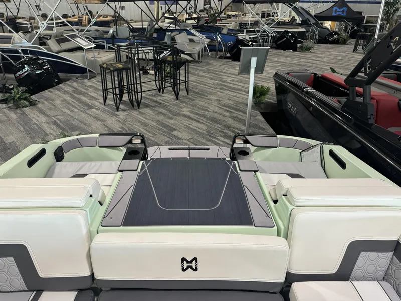 Slide: The Image of 2023 Heyday H22 boat interior at a showroom, featuring spacious seating and modern design. - 9
