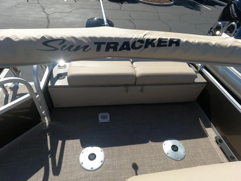 Slide: The Image of 2023 Sun Tracker SportFish 22 XP3 boat interior with seating and deck. - 10