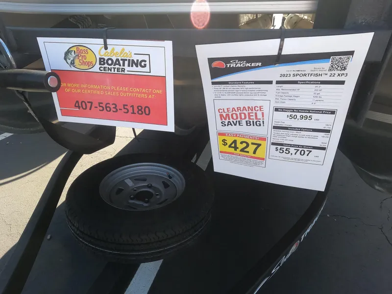 Slide: The Image of 2023 Sun Tracker SportFish 22 XP3 boat clearance sale at Cabela's Boating Center. - 11