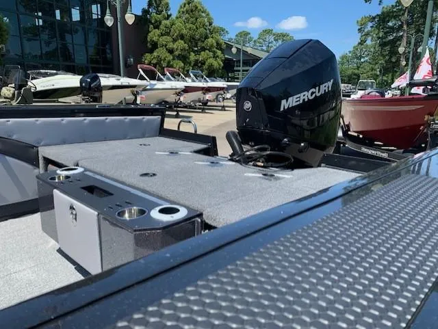 Slide: The Image of 2023 Ranger VX1888 WT boat with Mercury engine at a dealership. - 5