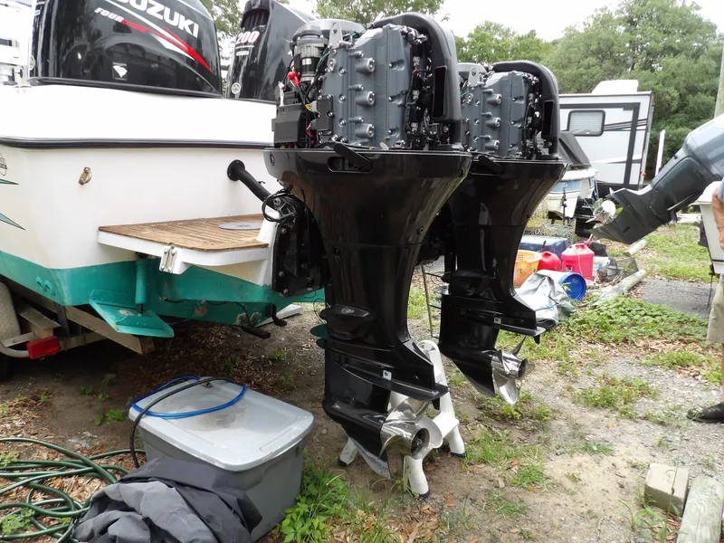 Slide: The Image of 1997 Hydra-Sports 2750 WA boat with dual Suzuki outboard motors on a trailer. - 17