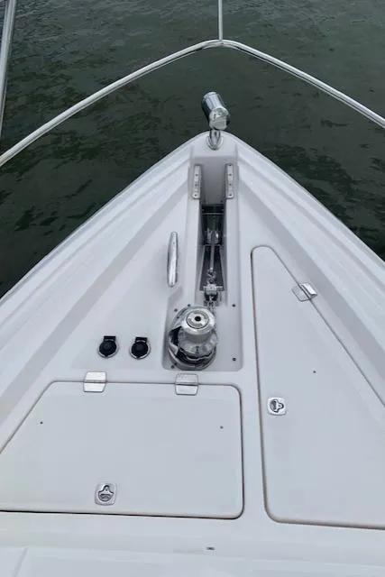 Slide: The Image of Bow of 2015 Regal 42 Sport Coupe yacht with anchor and winch. - 10