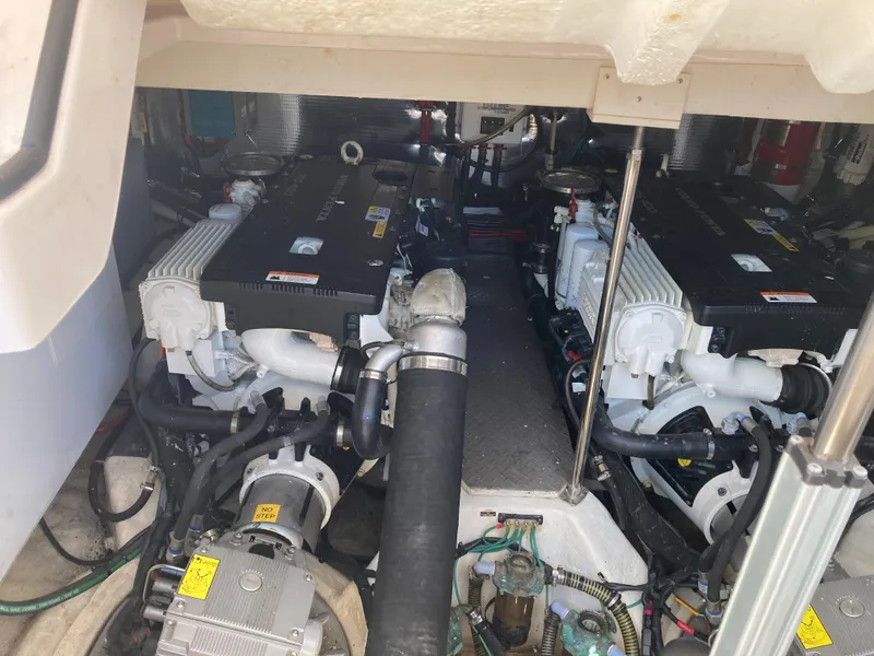 Slide: The Image of Engine room of a 2015 Regal 42 Sport Coupe yacht. - 31