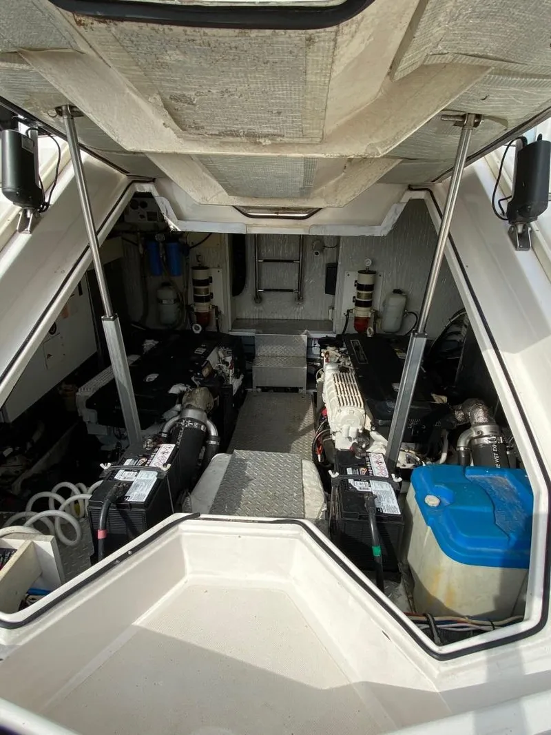 Slide: The Image of Engine room of a 2015 Regal 42 Sport Coupe yacht. - 32