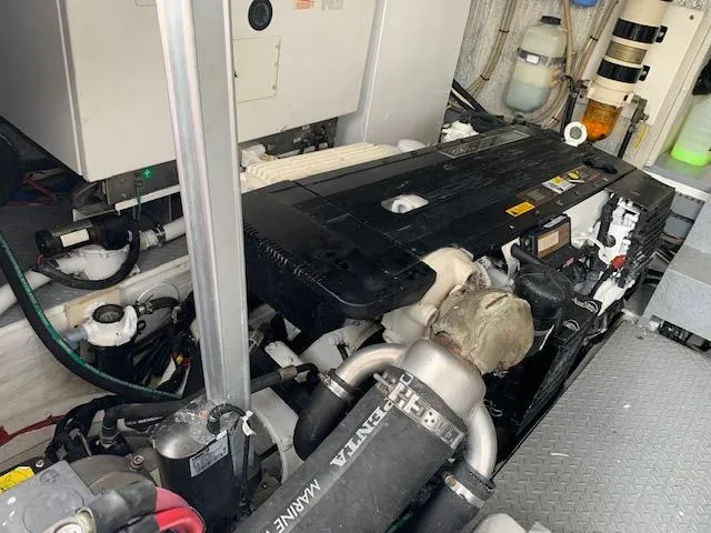 Slide: The Image of Engine room of a 2015 Regal 42 Sport Coupe yacht. - 34