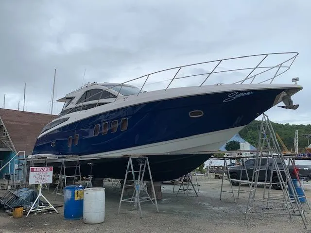 Slide: The Image of 2015 Regal 42 Sport Coupe yacht on dry dock for maintenance. - 7