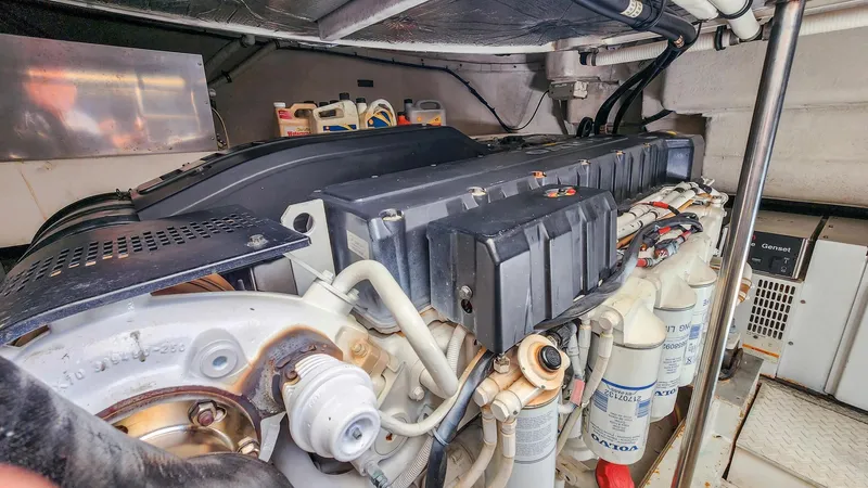 Slide: The Image of Engine room of a 2007 Cruisers Yachts 520 Express with visible components. - 26