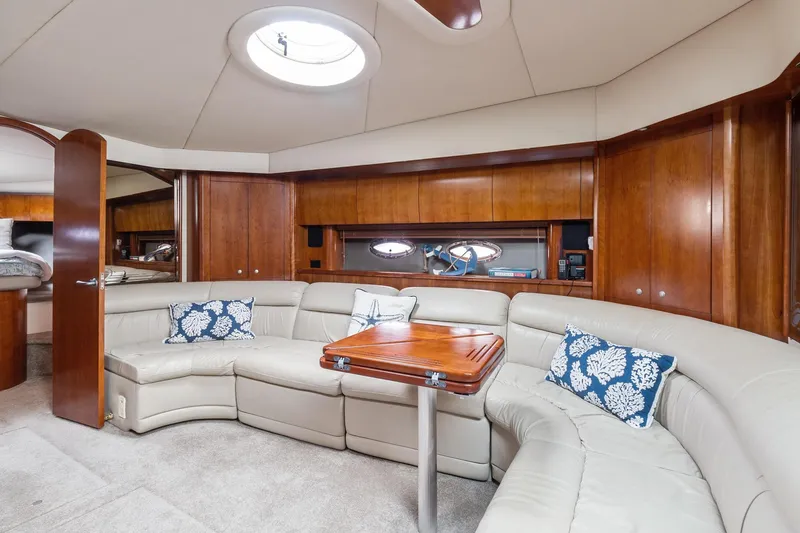 Slide: The Image of Luxurious interior of 2007 Cruisers Yachts 520 Express with leather seating and wooden accents. - 10