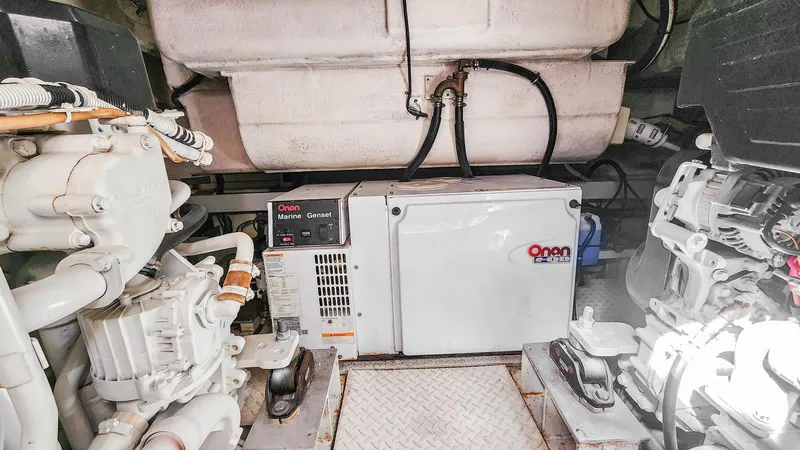 Slide: The Image of Engine room of a 2007 Cruisers Yachts 520 Express with Onan generator. - 15