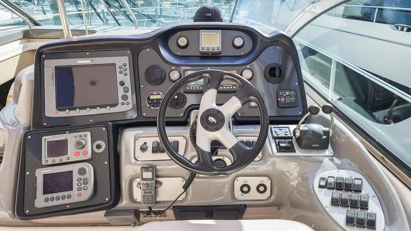 Slide: The Image of 2007 Cruisers Yachts 520 Express helm with advanced navigation and control systems. - 34