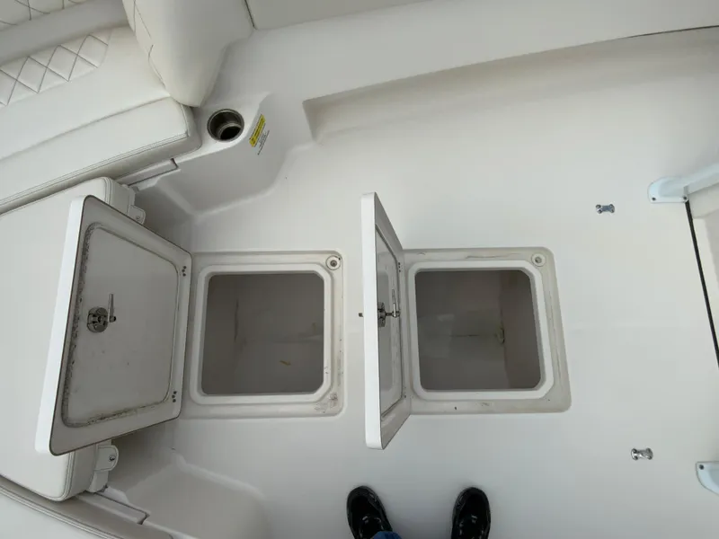 Slide: The Image of 2021 Blue Wave 2800 Makaira boat storage compartments. - 12