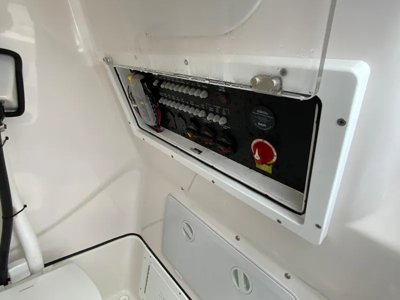 Slide: The Image of Electrical panel of 2021 Blue Wave 2800 Makaira boat with open access. - 15