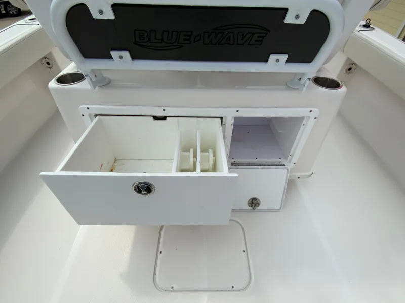 Slide: The Image of 2021 Blue Wave 2800 Makaira boat storage compartments and tackle drawers. - 17