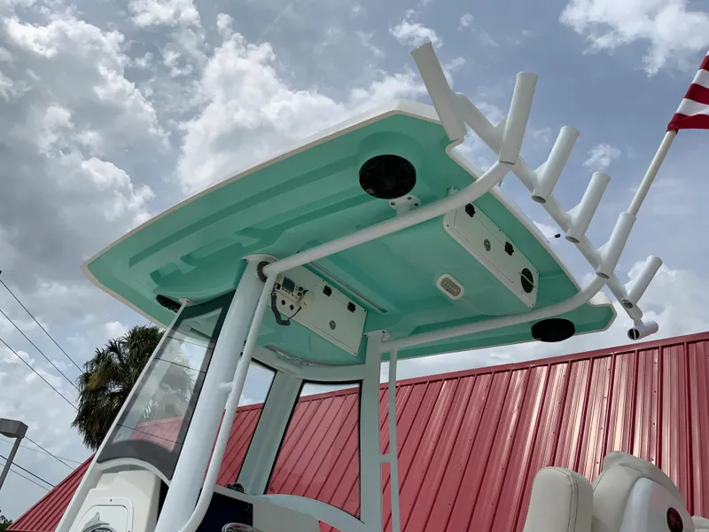 Slide: The Image of 2021 Blue Wave 2800 Makaira boat with T-top and rod holders. - 20