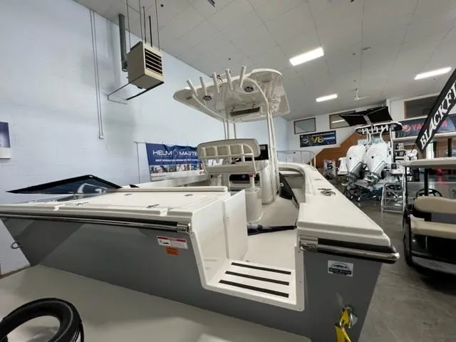 Slide: The Image of 2023 Parker 2500 Special Edition boat on display in showroom. - 14