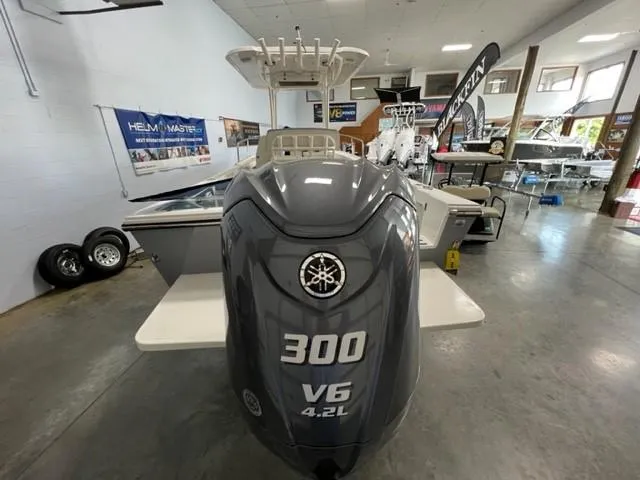 Slide: The Image of 2023 Parker 2500 Special Edition boat with Yamaha 300 V6 4.2L engine in showroom. - 15