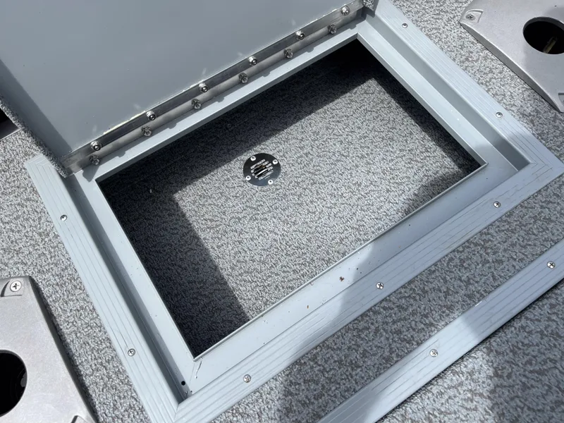 Slide: The Image of Open storage compartment on 2023 Starcraft Stealth 166 DC boat. - 16