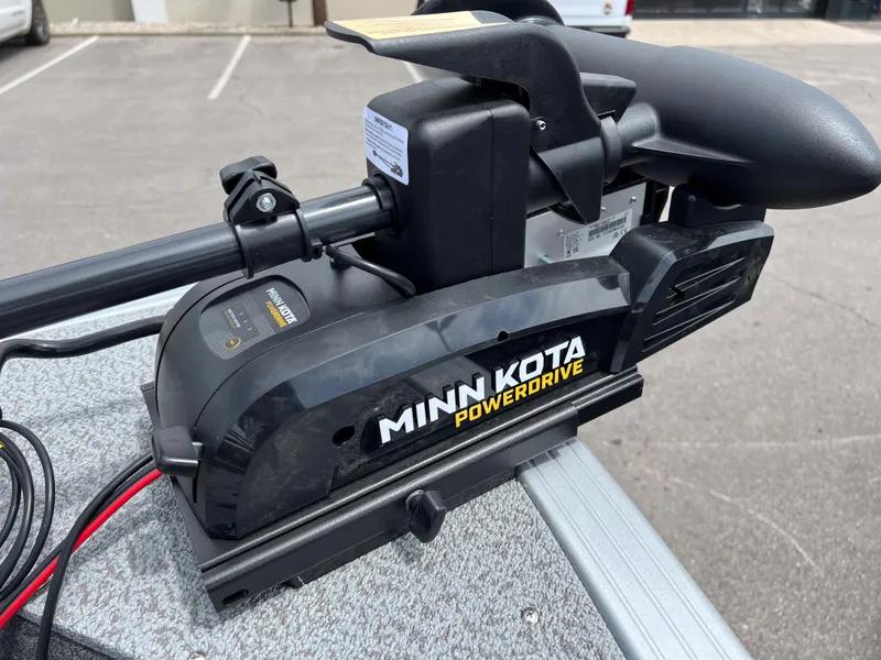 Slide: The Image of Minn Kota PowerDrive motor on 2023 Starcraft Stealth 166 DC boat, parked outdoors. - 22